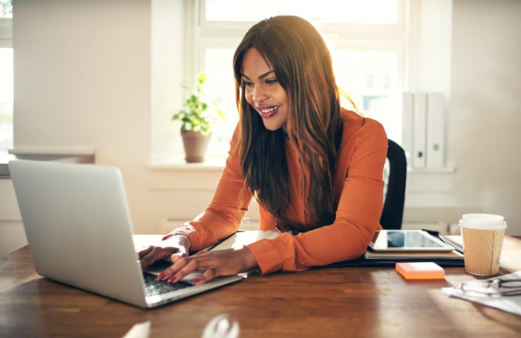 Businesswoman working on her laptop