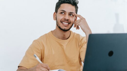 benefits of being a young entrepreneur - a young man working on a laptop