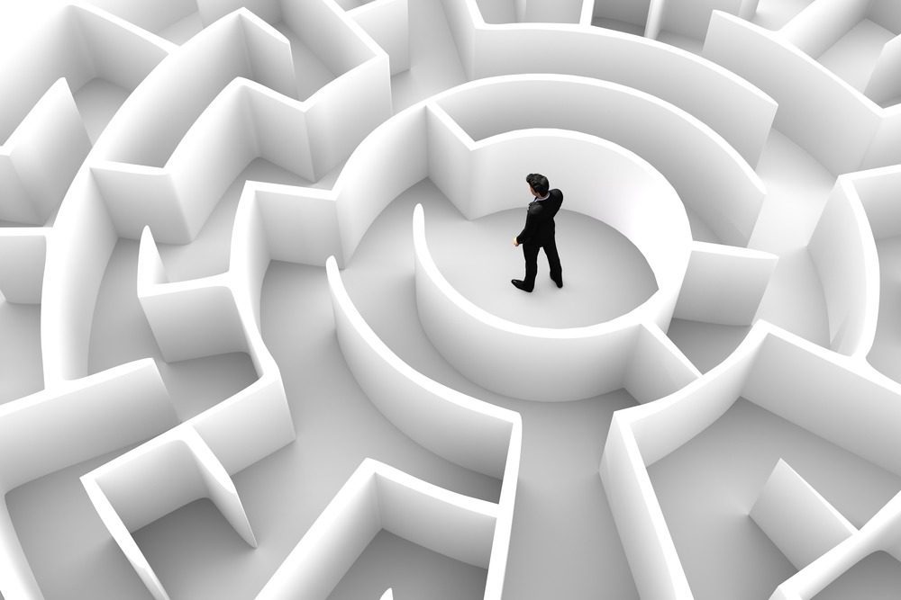 a person finding his way out in a maze